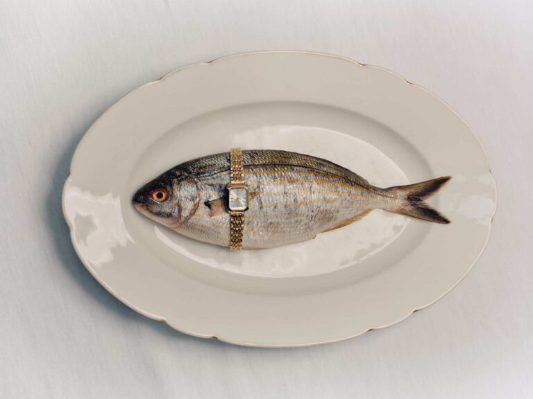 A fish with a watch